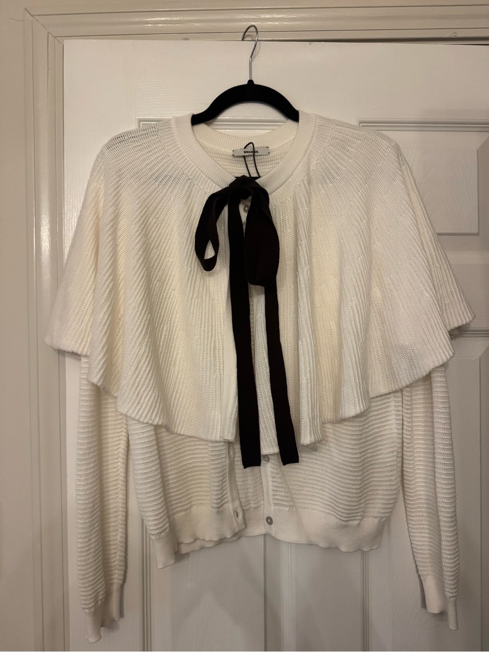 Siedras Cream Knit Cape-Front Sweater with Brown Tie